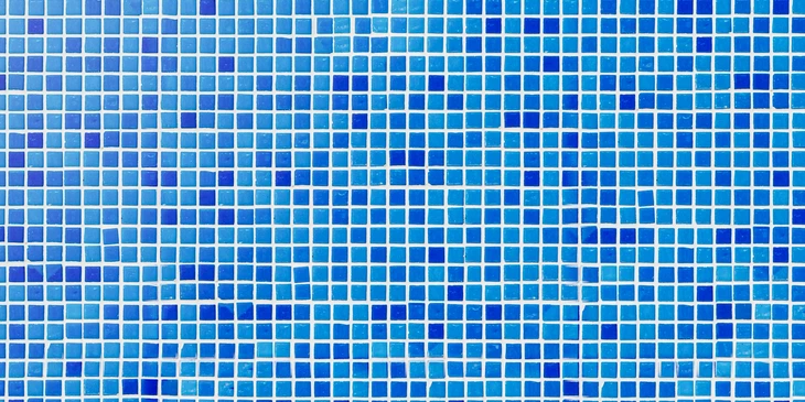 Motif géométrique abstrait composé de carreaux carrés uniformes disposés en grille régulière